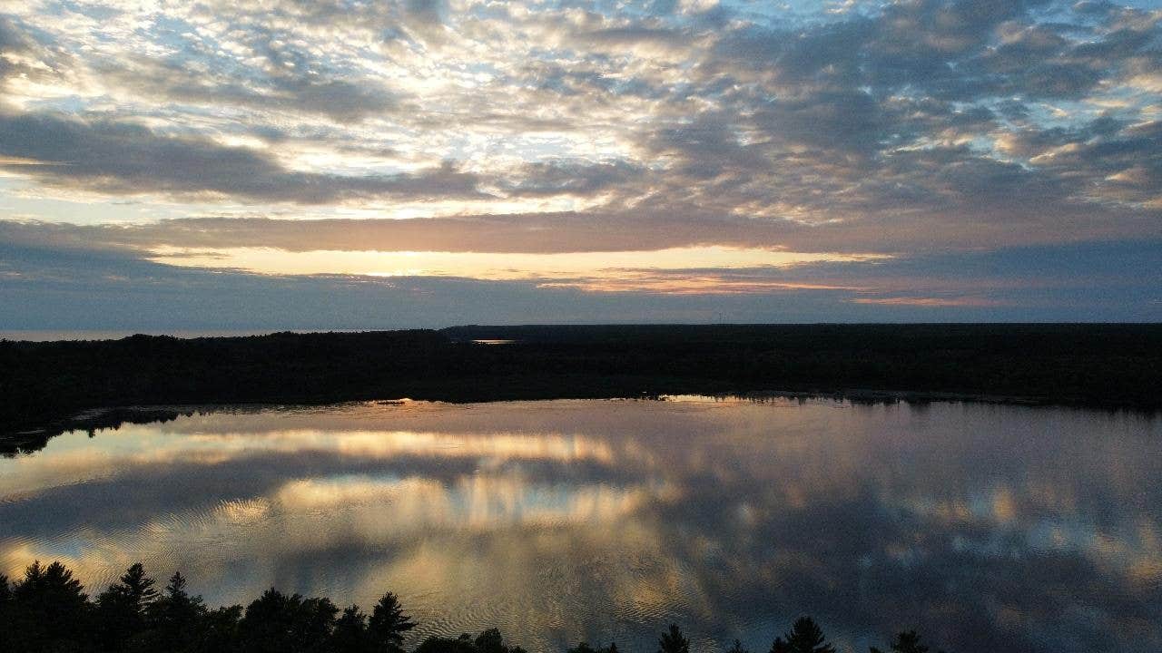 Escape to Serenity: Brevoort Lake Campground, Your Michigan Getaway