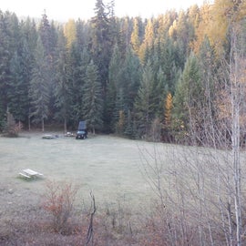 Several campsites in the meadow.