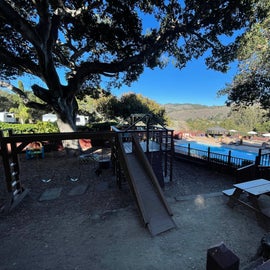 playground, pool, and large deck area