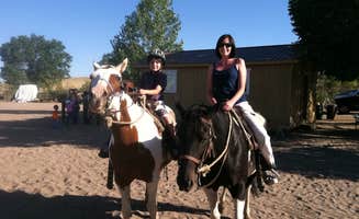 Penny H.'s photo of camping with a horse at Indian Paintbrush Campground—Bear Creek Lake Park near Littleton, CO