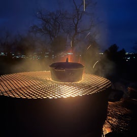 grills over campfire provided