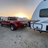Overlooking my rig toward the west, the dunes, the ocean and the sunset.