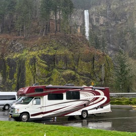 RV parking with Multnomah Falls in the background
