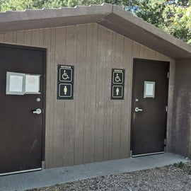 gendered accessible vault toilets