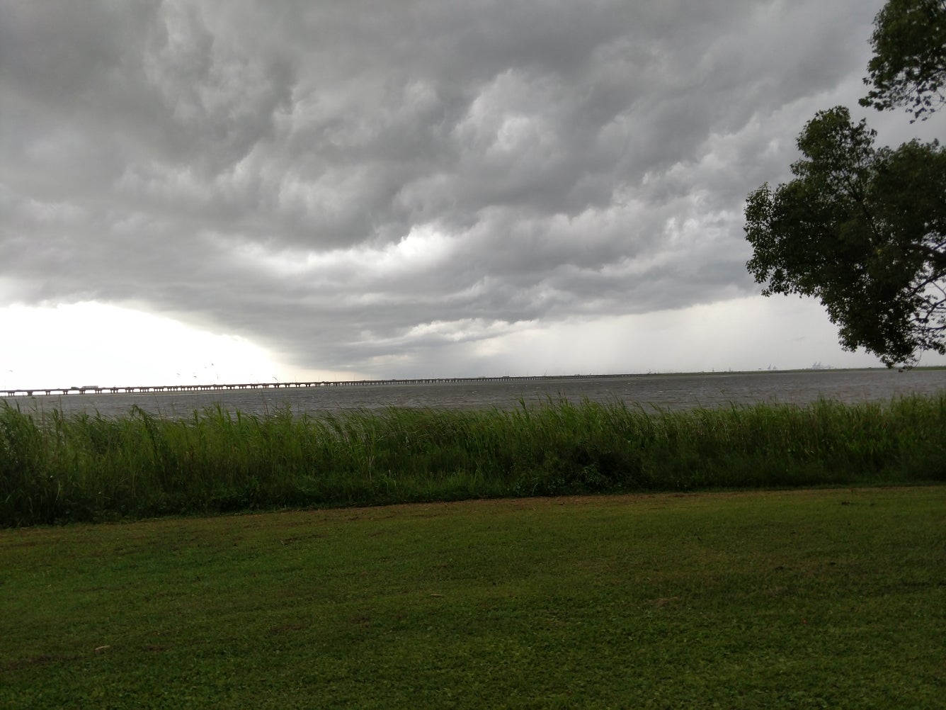 clouds moving across Mobile bay.