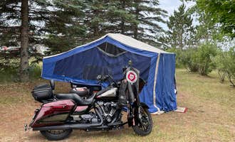 Camping near Starlight Campground and RV Park: Antrim Meadows Campground, Mancelona, Michigan