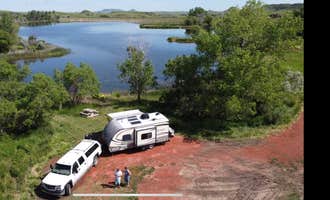 Camping near Dispersed Site - Scoria Pit: Camel's Hump Lake, Sentinel Butte, North Dakota
