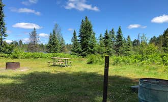 Camping near Ojibwa RV Park: Big Lake State Forest Campground, Covington, Michigan