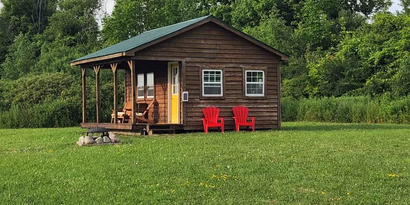 Camper submitted image from Off Grid Sunset View Sleeping Cabin