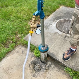 Water fill-up - Be sure to pull the round gold diverter down so water can be redirected into the hose.