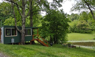 Ravens Retreat Hocking Hills Primitive Camp Sites & Pollinator Tiny Home Treehouse Glamping Site