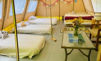 Andrea B.'s photo of glamping accommodations at The Woodland's Edge Glampsite and Hot Tubs near New Salem, MA