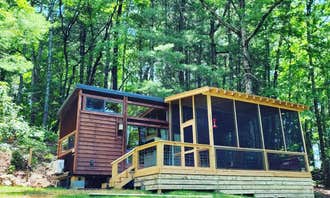 Camping near Jackrabbit Mountain: Red Bird Ridge Lake Front Tiny House, Hayesville, North Carolina