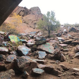 All the rocks around the falls and under the bridge are tagged with unique phrases and pictures.   They just encourage those tagging to not leave messages that are not family friendly