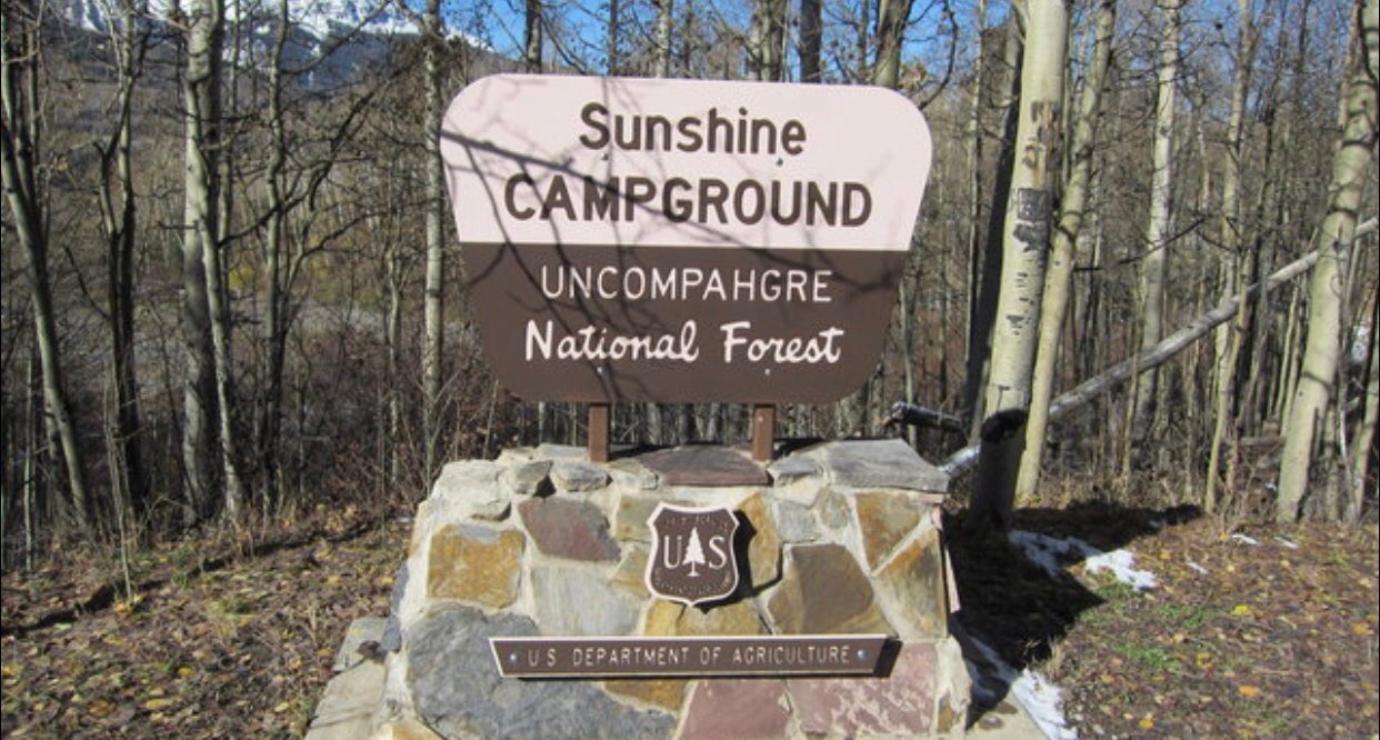 at the entrance of every campground you will find their sign with their identifying department of maintenance