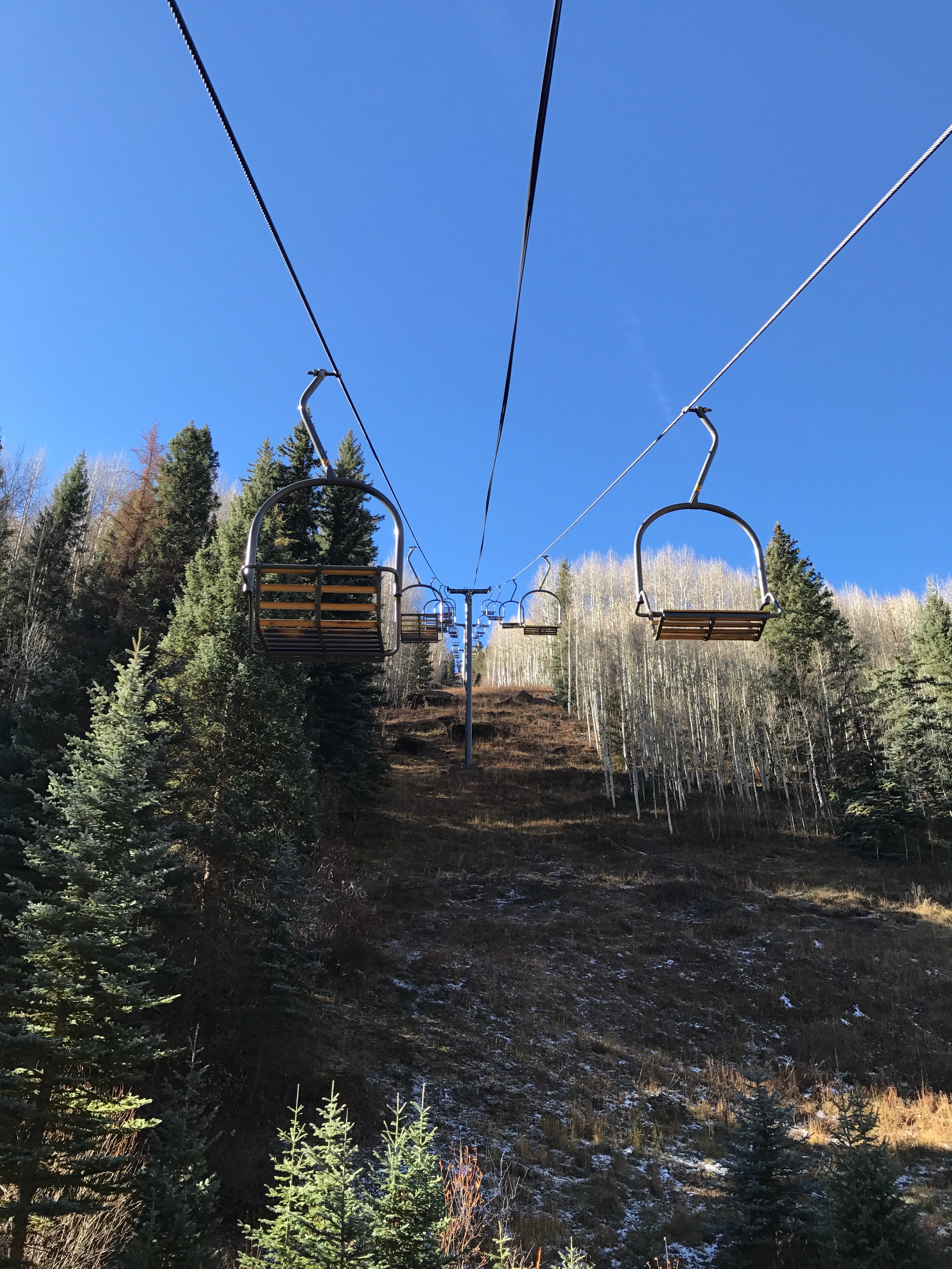 busy season in town has not yet begun so the lifts sit vacant and not yet running all the while the campground busy season is starting to come to a close