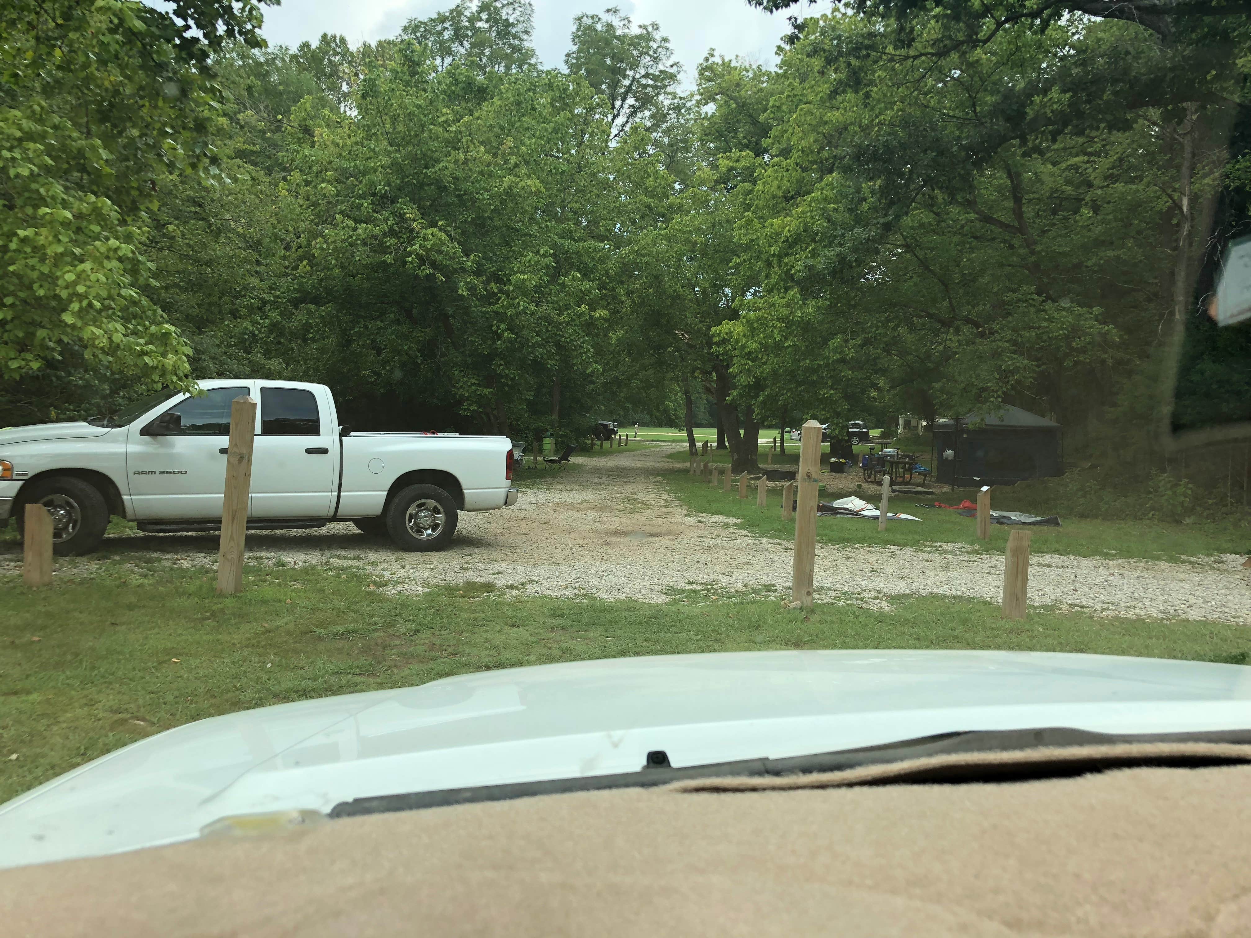 My “campsite” is the gravel area to the right.  Between the truck and the posts...I couldn’t back in from either direction 