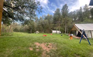 Brendan M.'s photo of tent camping at Bear Den Cabins and Camp in South Dakota