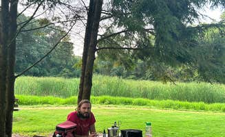 Sophia P.'s photo of camping with pets at Big Bend Trailhead Primitive Camping (Summit Metro Parks) near Michael J Kirwan Lake