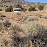 Review photo of campsite with two picnic tables and the shelter of a couple trees by DL M., September 14, 2024