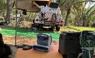 ENRIQUE T.'s photo of camping with pets at Clearwater Lake Campground near Lake Helen, FL