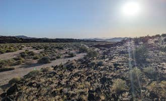 Camping near Silurian Dry Lake Bed: Indian Springs near lava field — Mojave National Preserve, Baker, California