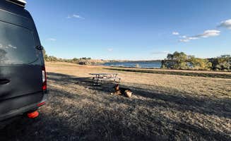 Eric A.'s photo of camping with pets at Sweet Briar Lake in North Dakota