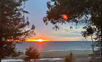 Willow M.'s photo of a dispersed camping area at Peninsula Point Lighthouse Access Road - Dispersed in Michigan