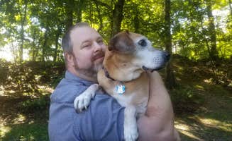 Sue B.'s photo of camping with pets at Moon Lake Recreation Area Campground — Pinchot State Forest near Sweet Valley, PA