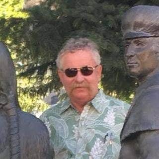 John B.